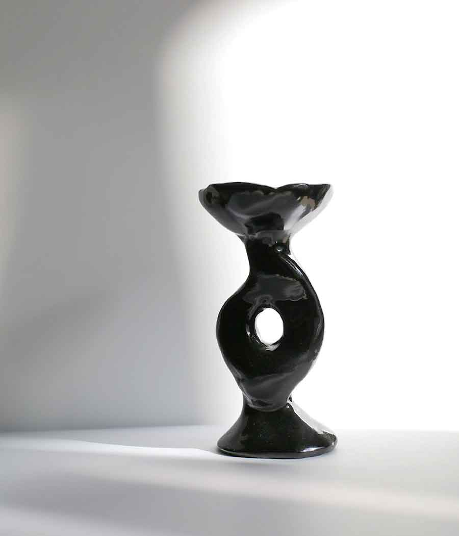 Handcrafted Nordic style ceramic incense burner in black with white background